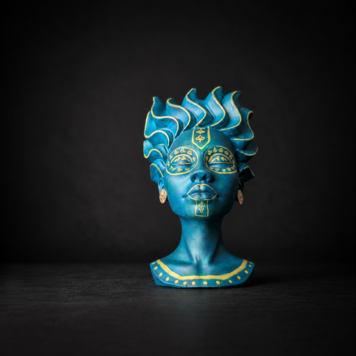 Teal and gold bust planter detail