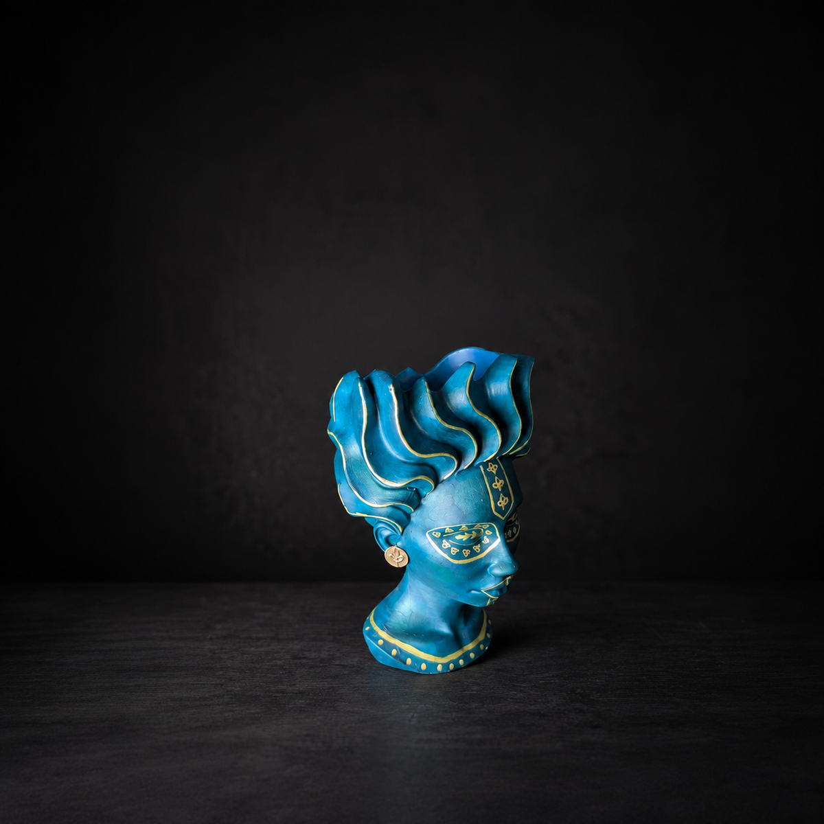 Teal African head planter with gold detail