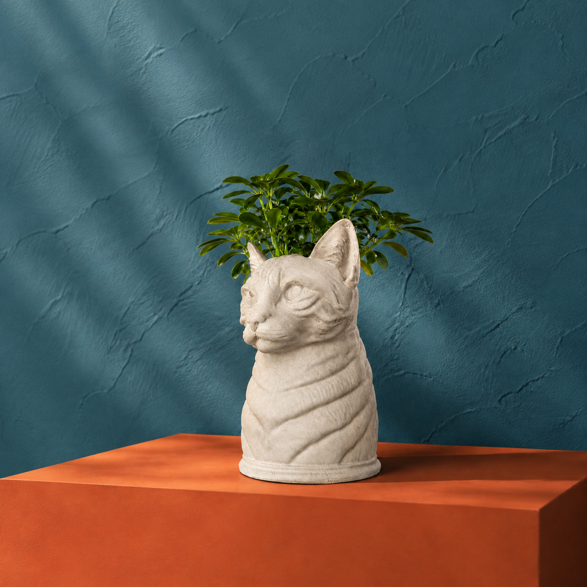 Custom cat portrait planter with bright green houseplant