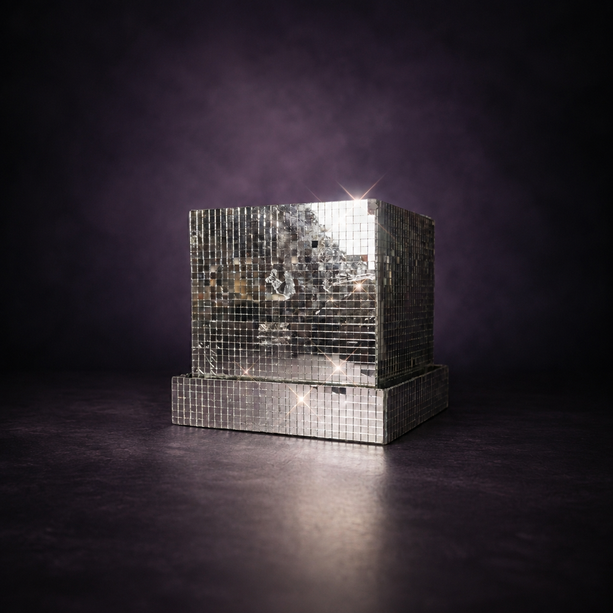 Mirror tile cube planter catching light with star sparkles on purple background