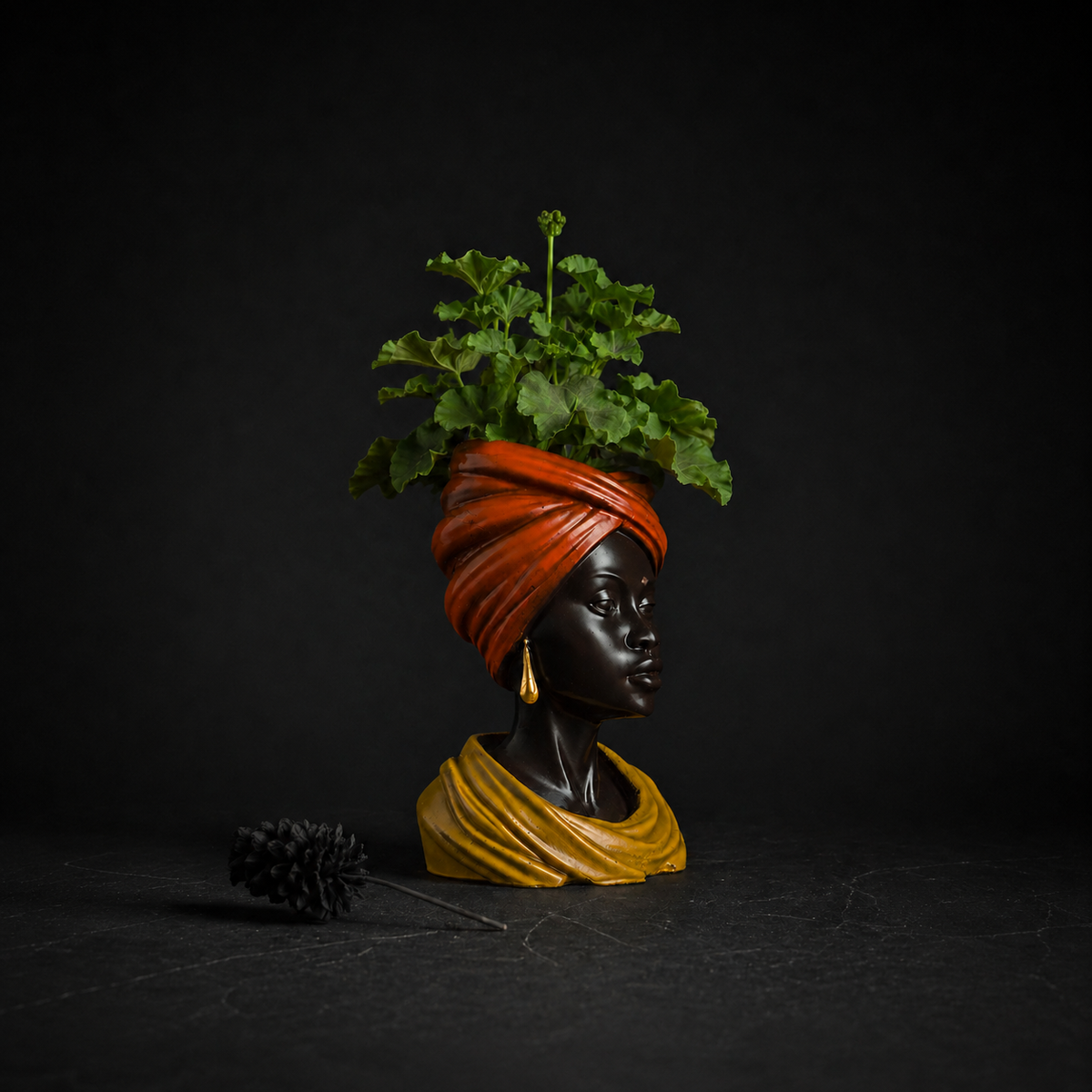 Golden Hour indoor planter styled with plant on dark background