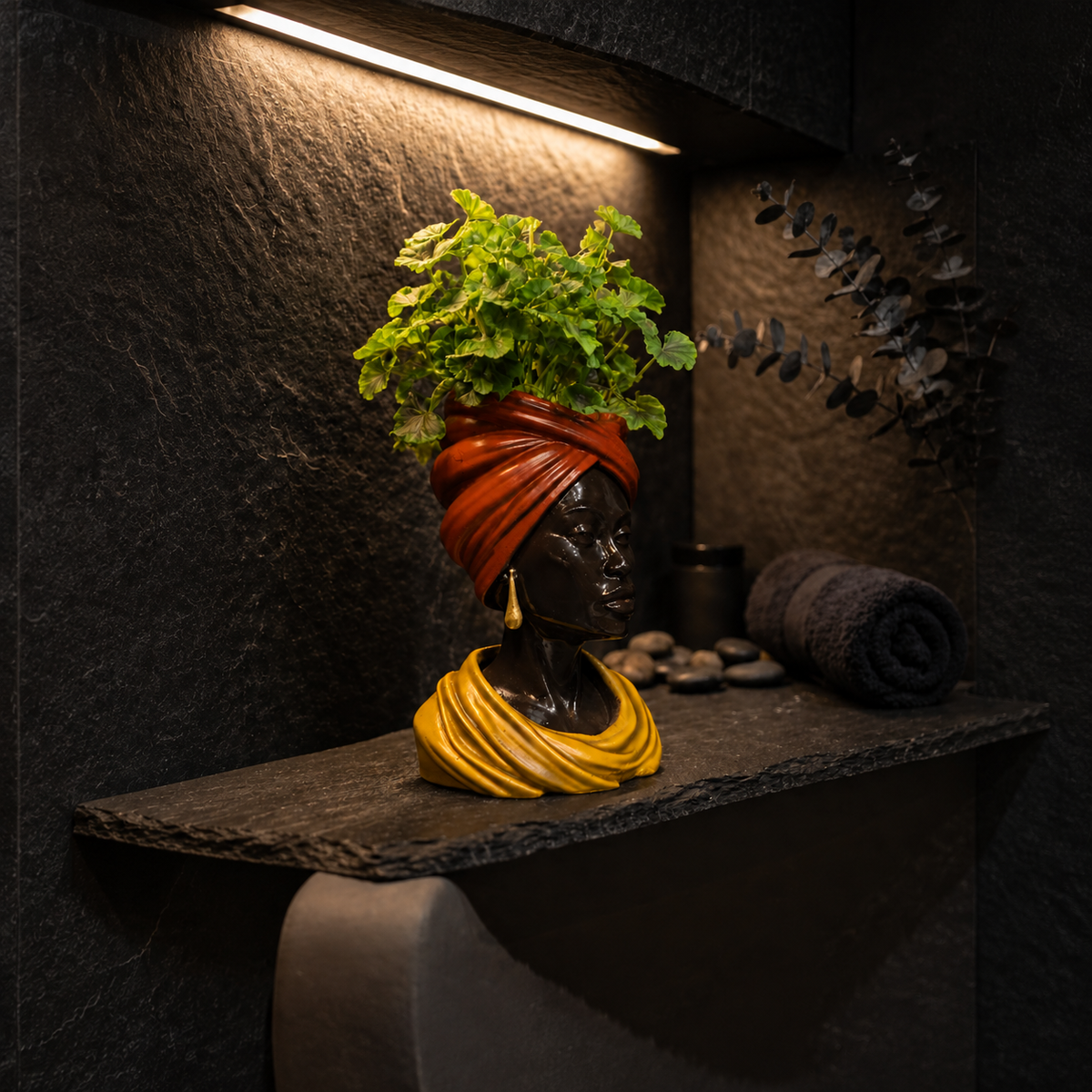 Golden Hour planter styled on dark shelf with plant