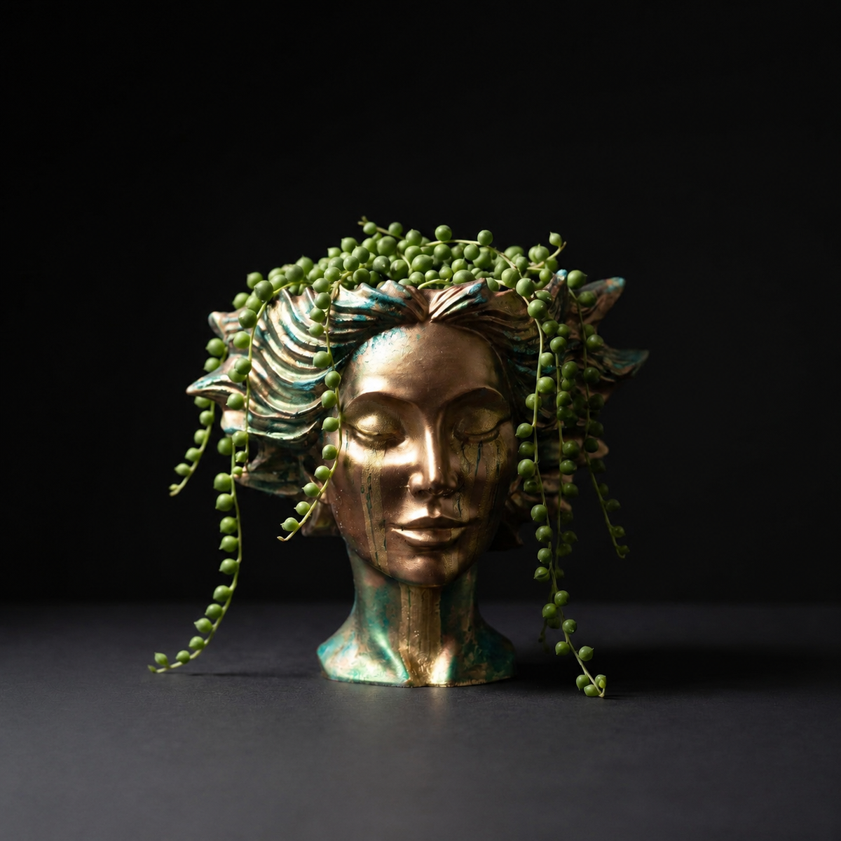 Gold face plant pot front view