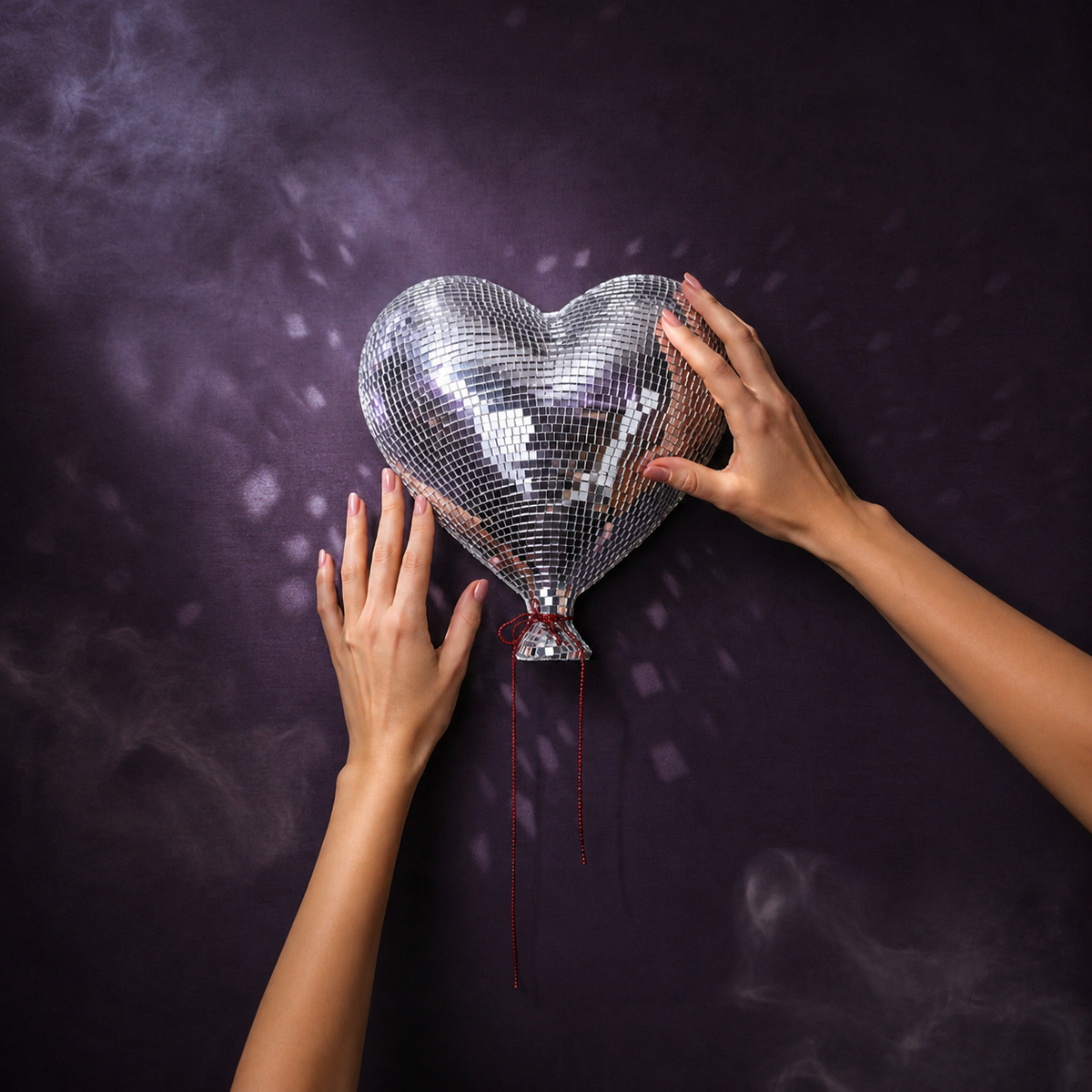 Heartthrob mirror ball heart wall art hands scale image