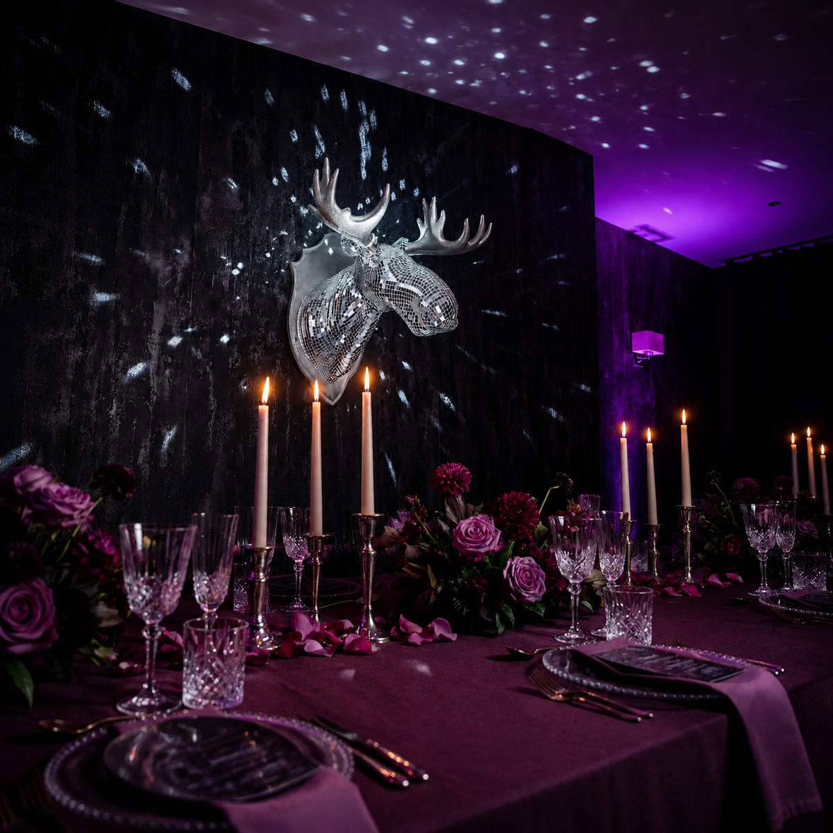 Mirrorball Moose displayed above a candlelit dining table with purple florals
