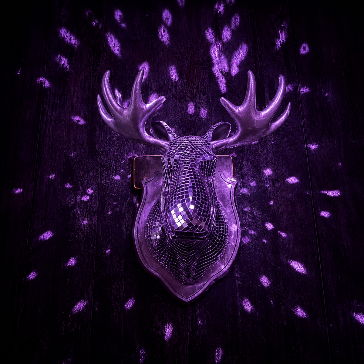 Mirrorball Moose front view with purple disco light reflections