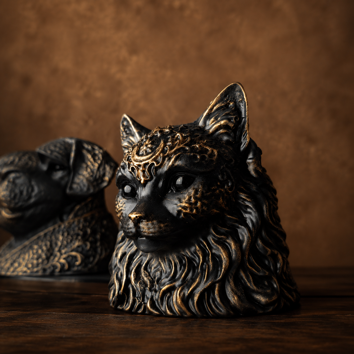 Close detail of custom cat planter with moon ornament and antique gold painted finish