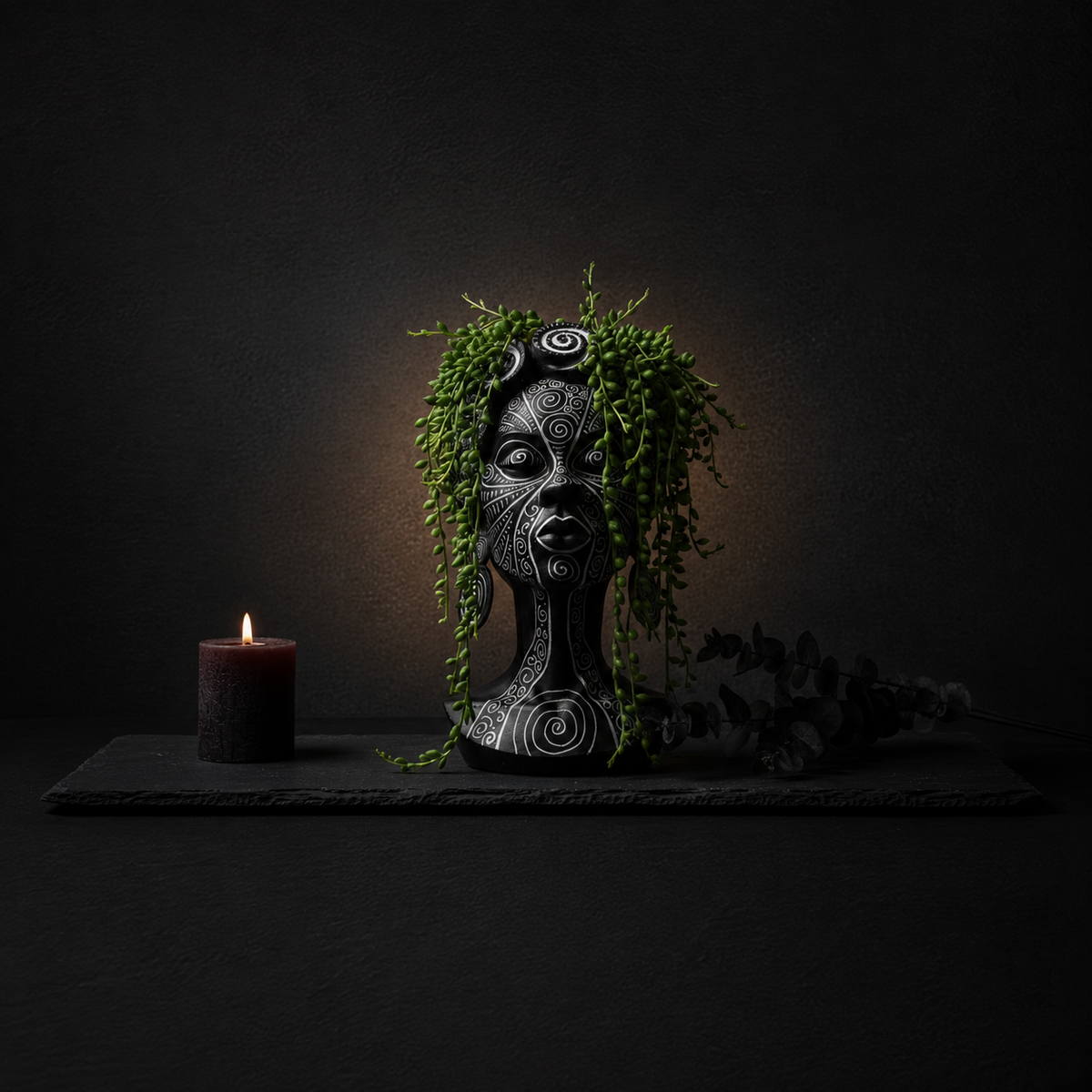 Spiral face plant pot with trailing greenery