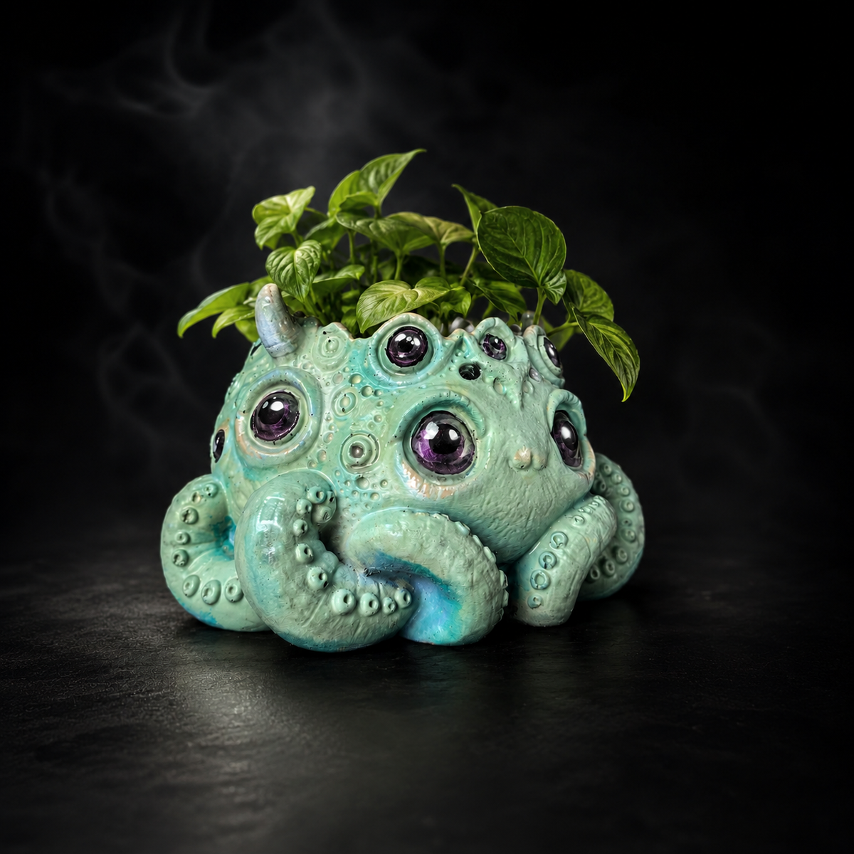 Angled view of Noodle cosmic horror plant pot with mint green finish