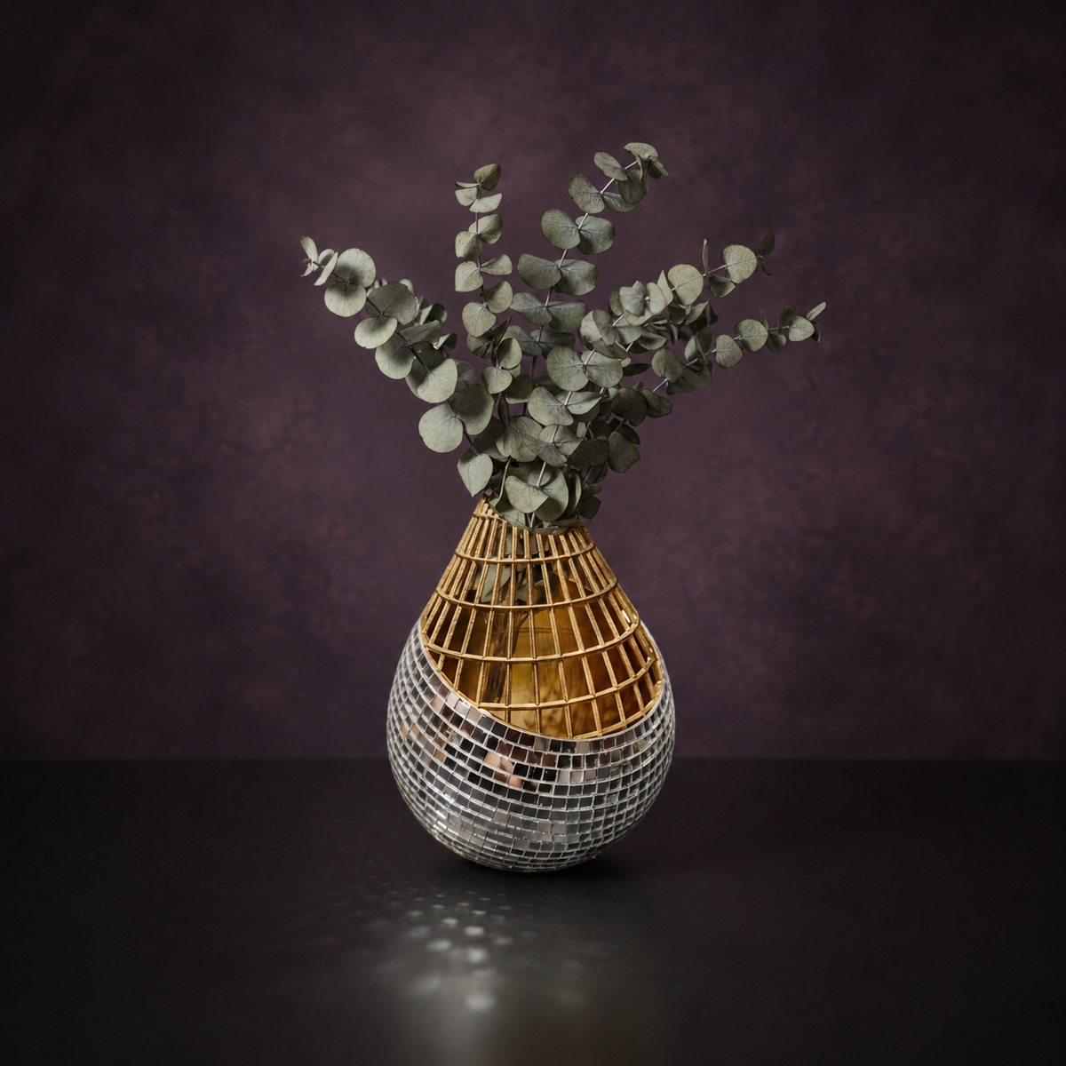 Mirror mosaic vase with dried eucalyptus