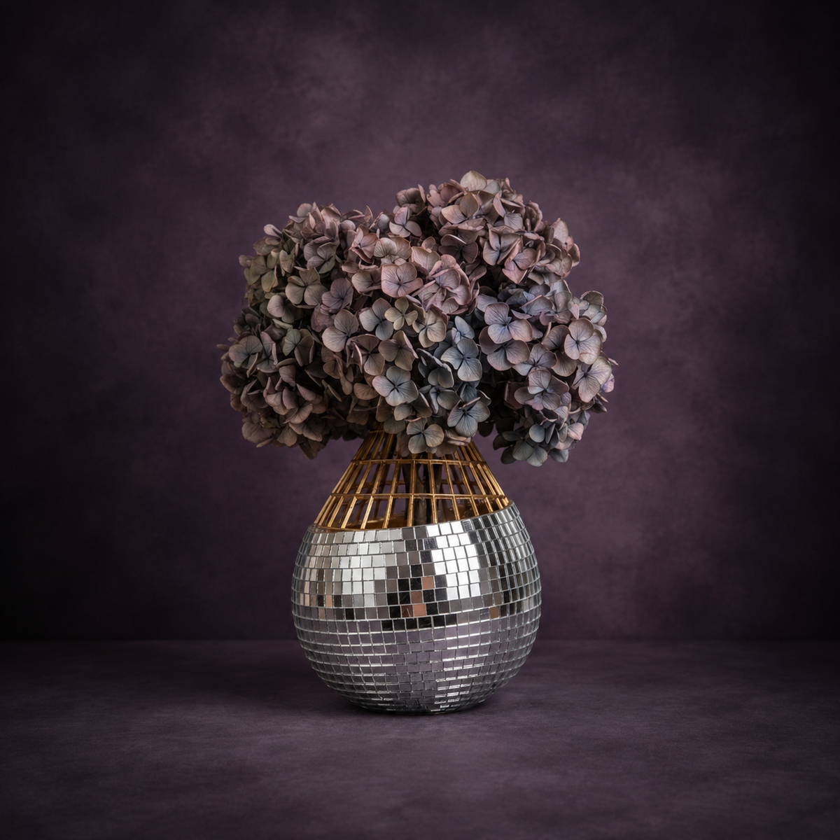 Mirror mosaic vase with dried hydrangea