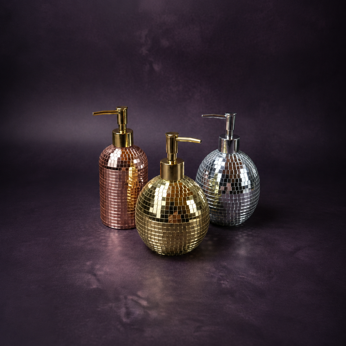 The Lather Ball rose gold mirror soap dispenser close up detail