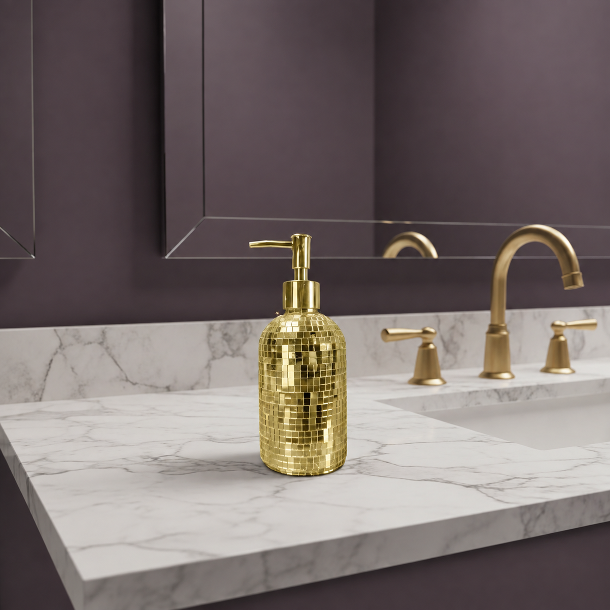 Classic gold mirror mosaic soap dispenser by a sink