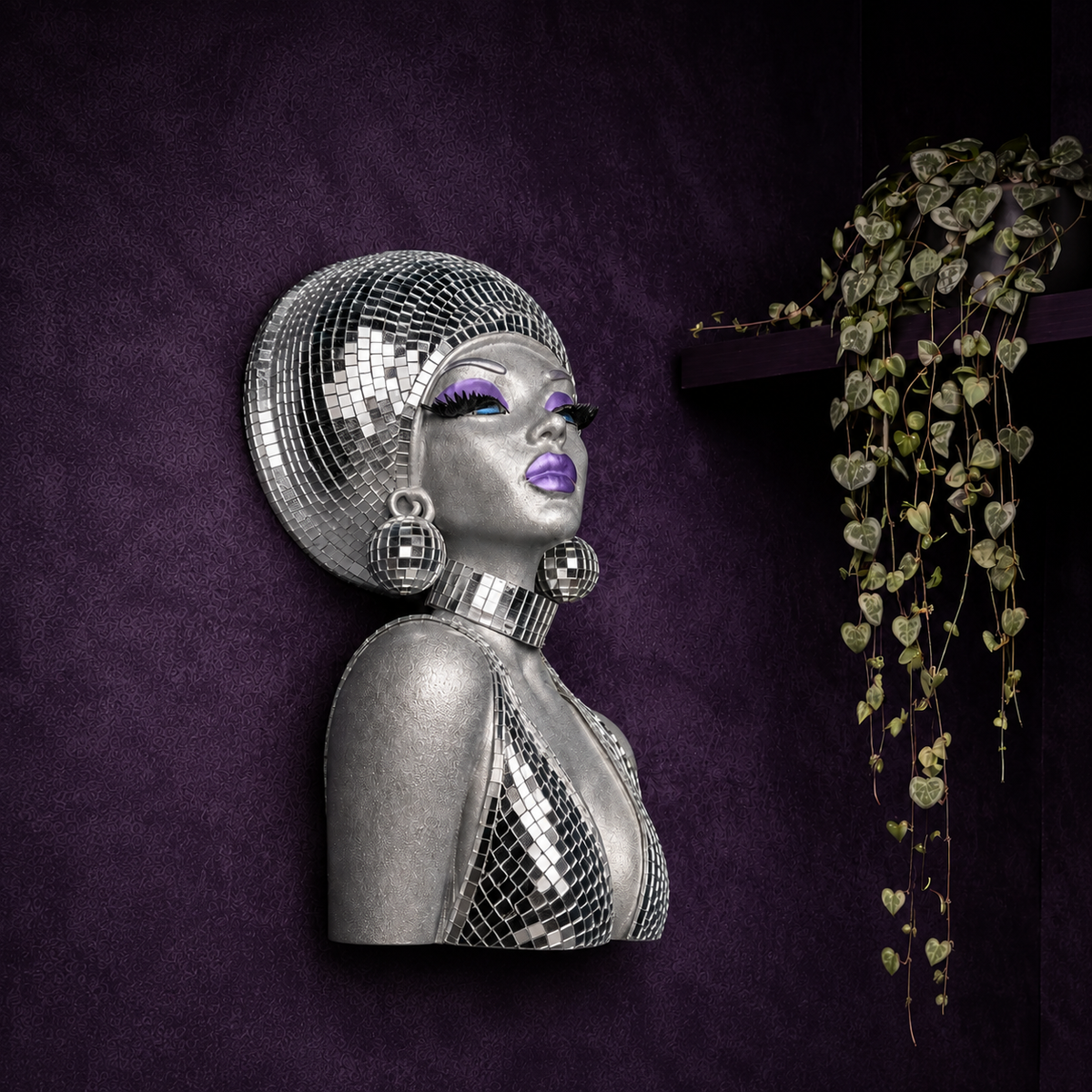 The Mirrorball Muse mirror ball bust wall art with trailing plant shelf