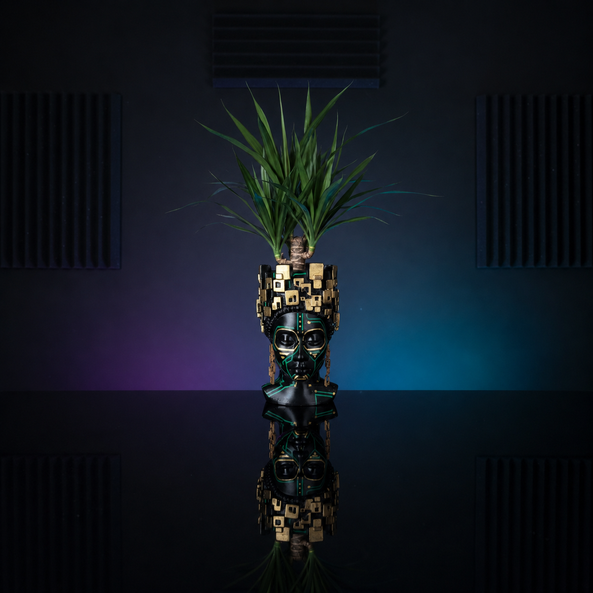 The Motherboard head planter with a dracaena in a dark gaming room
