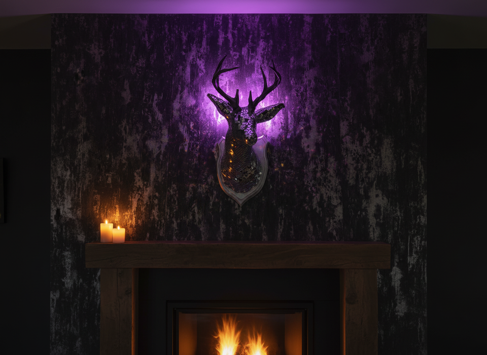 Stag Night mounted above fireplace with candles