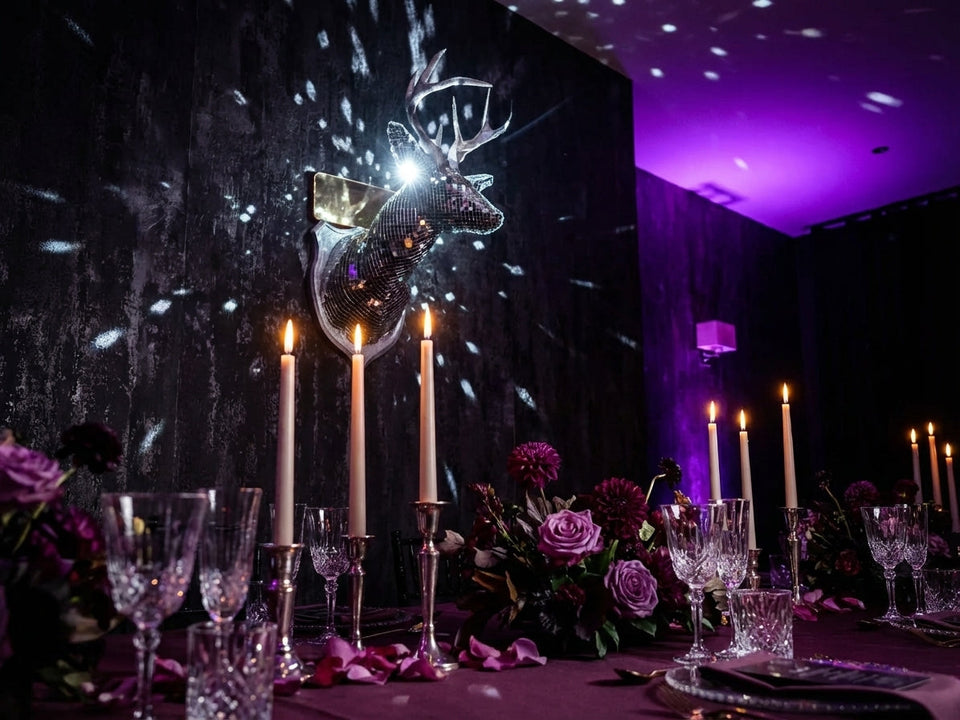 Stag Night as wedding centrepiece with candles and flowers