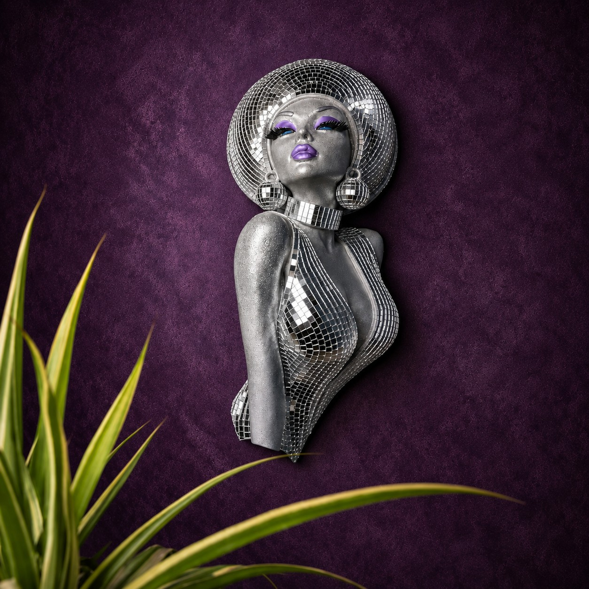 The Mirrorball Muse mirror ball bust wall art styled with plant foreground